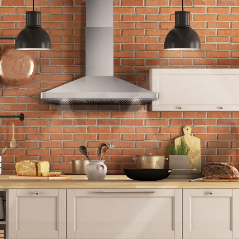 Retro white kitchen in a old interior with brick wall
